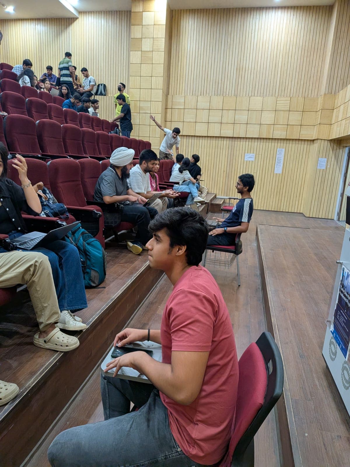 Students at a UFC session, laptops open